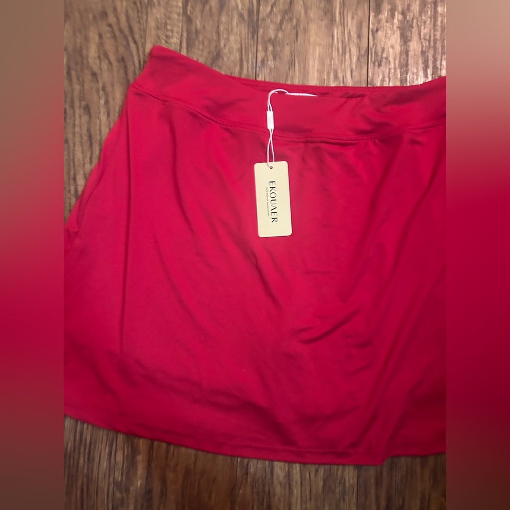 Women’s red  golf/ tennis skort new with tags